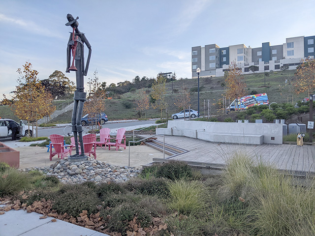 Musician playing horn by Jerry Barrish